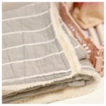 Manta rayada con corderito (varios modelos)