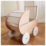 Cochecito de muñecos